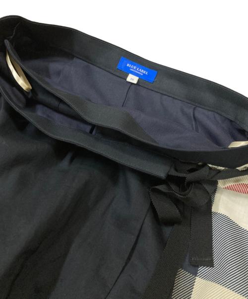 BLUE LABEL CRESTBRIDGE（ブルーレーベルクレストブリッジ）BLUE LABEL CRESTBRIDGE (ブルーレーベルクレストブリッジ) コンビティアードスカート ネイビー サイズ:38の古着・服飾アイテム