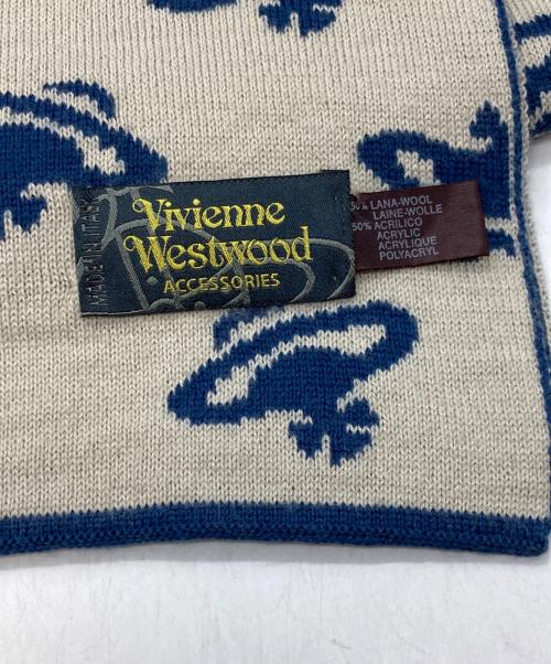 Vivienne Westwood（ヴィヴィアンウエストウッド）Vivienne Westwood (ヴィヴィアンウエストウッド) 総柄リバーシブルマフラー アイボリー×ネイビーの古着・服飾アイテム