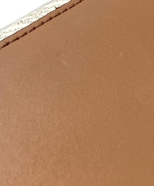 MICHAEL KORS（マイケル・コース）MICHAEL KORS (マイケル・コース) エミリア スモール ロゴ サッチェル ブラウン×ホワイトの古着・服飾アイテム