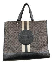 COACH（コーチ）の古着「シグネチャー ジャカード ウィズ ストライプ アンド コーチ パッチ」｜ブラウン
