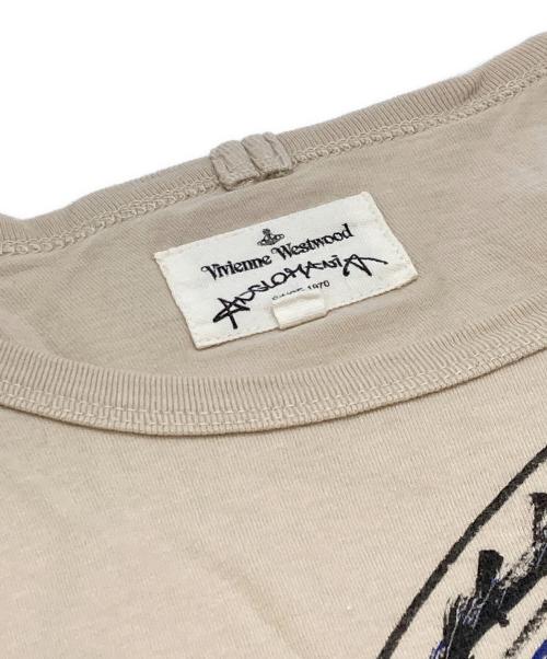 Vivienne Westwood ANGLOMANIA（ヴィヴィアンウエストウッドアングロマニア）Vivienne Westwood ANGLOMANIA (ヴィヴィアンウエストウッドアングロマニア) オーブプリントカットソー ベージュ サイズ:38の古着・服飾アイテム