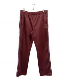 stussy（ステューシー）の古着「トラックパンツ」｜レッド