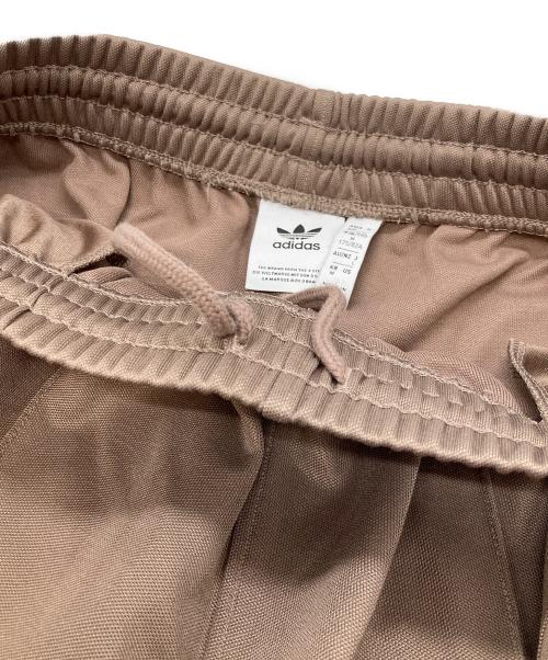 adidas（アディダス）adidas (アディダス) バギーフィット ファイヤーバードトラックパンツ ブラウン サイズ:Ⅼの古着・服飾アイテム