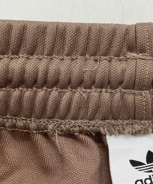 adidas（アディダス）adidas (アディダス) バギーフィット ファイヤーバードトラックパンツ ブラウン サイズ:Ⅼの古着・服飾アイテム