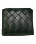 BOTTEGA VENETA（ボッテガベネタ）の古着「イントレチャート二つ折り財布」｜グリーン