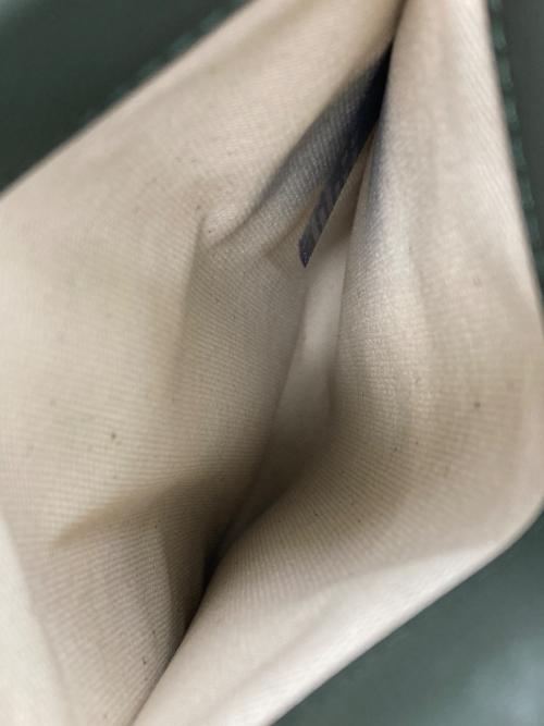 Maison Margiela（メゾンマルジェラ）Maison Margiela (メゾンマルジェラ) ラバー ネックストラップ付き スマートフォン ケース グリーンの古着・服飾アイテム