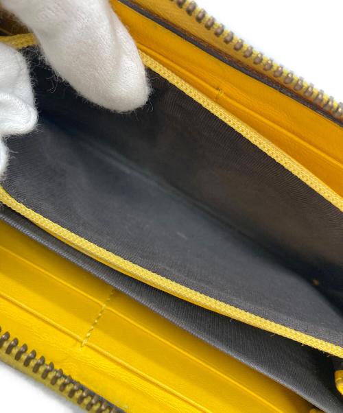 GUCCI（グッチ）GUCCI (グッチ) 長財布 イエローの古着・服飾アイテム