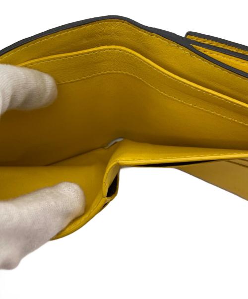 FENDI（フェンディ）FENDI (フェンディ) 2つ折り財布 イエローの古着・服飾アイテム