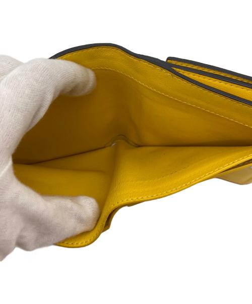 FENDI（フェンディ）FENDI (フェンディ) 2つ折り財布 イエローの古着・服飾アイテム