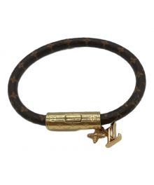 LOUIS VUITTON（ルイ ヴィトン）の古着「LV プッシュ」｜ブラウン