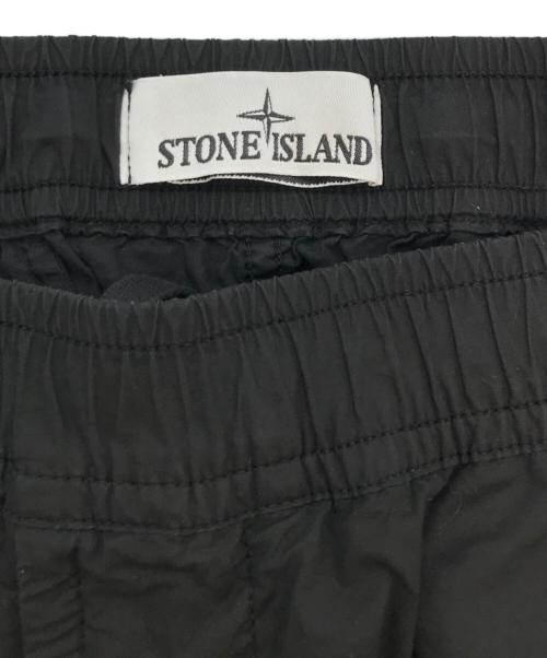 STONE ISLAND（ストーンアイランド）STONE ISLAND (ストーンアイランド) ストレッチ ガーメントダイ テーパードカーゴパンツ ブラック サイズ:３２の古着・服飾アイテム