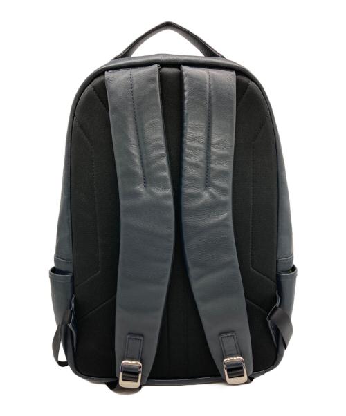 totem re vooo（トーテムリボー）totem re vooo (トーテムリボー) パンチングレザーデイパック ネイビーの古着・服飾アイテム