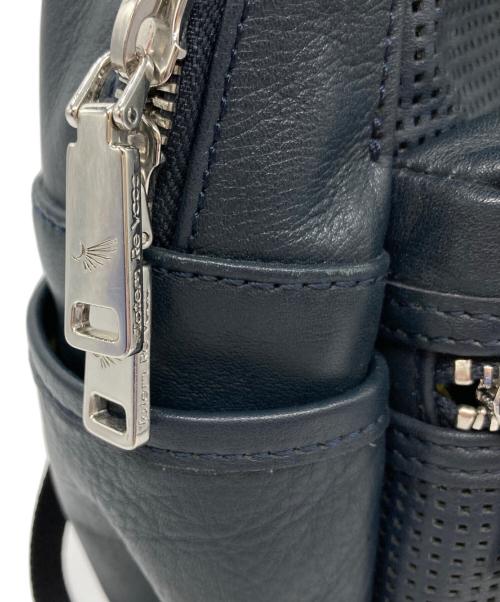 totem re vooo（トーテムリボー）totem re vooo (トーテムリボー) パンチングレザーデイパック ネイビーの古着・服飾アイテム