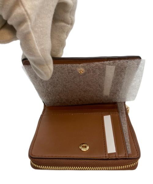 MICHAEL KORS（マイケル・コース）MICHAEL KORS (マイケルコース) 2つ折り財布 ホワイト 未使用品の古着・服飾アイテム