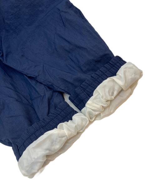 REEBOK（リーボック）REEBOK (リーボック) ナイロンジャケット ネイビー×ホワイト サイズ:SIZE Lの古着・服飾アイテム