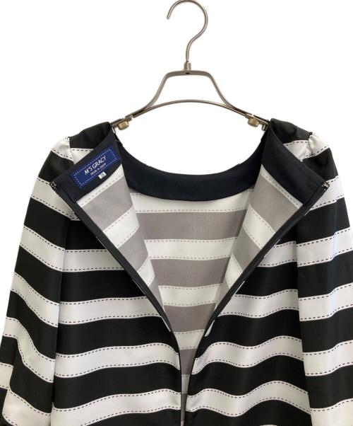 M'S GRACY MAGGY（エムズグレイシーマギー）M'S GRACY MAGGY (エムズグレイシーマギー) カメリアチュニック ブラック×ホワイト サイズ:38の古着・服飾アイテム