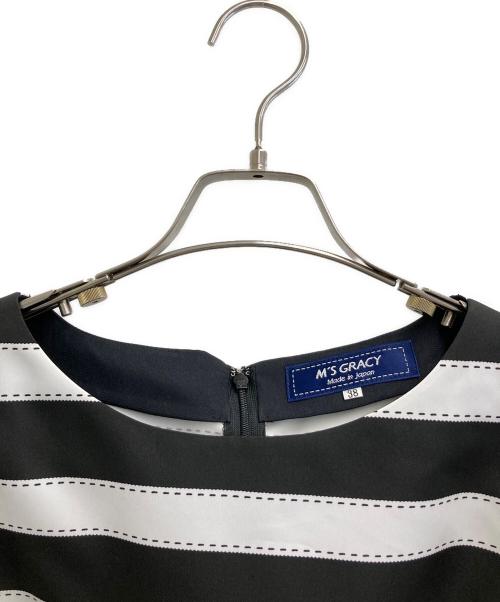 M'S GRACY MAGGY（エムズグレイシーマギー）M'S GRACY MAGGY (エムズグレイシーマギー) カメリアチュニック ブラック×ホワイト サイズ:38の古着・服飾アイテム