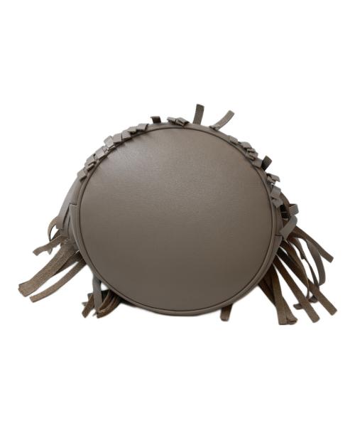 J&M DAVIDSON（ジェイ＆エム デヴィッドソン）J&M DAVIDSON (ジェイ＆エム デヴィッドソン) カーニバル 巾着ショルダーバッグ ベージュの古着・服飾アイテム