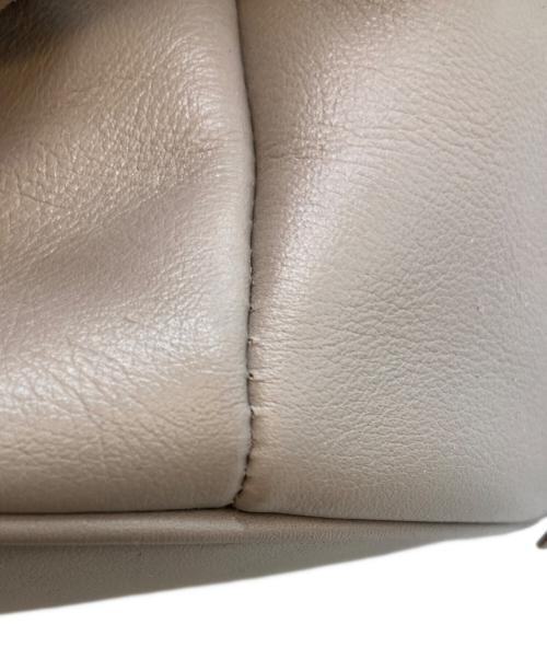 J&M DAVIDSON（ジェイ＆エム デヴィッドソン）J&M DAVIDSON (ジェイ＆エム デヴィッドソン) カーニバル 巾着ショルダーバッグ ベージュの古着・服飾アイテム