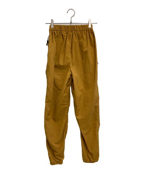 nagonstans（ナゴンスタンス）nagonstans (ナゴンスタンス) 21AW ライトシェルタフタトラックパンツ オレンジ サイズ:Sの古着・服飾アイテム