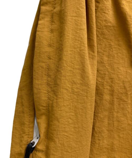 nagonstans（ナゴンスタンス）nagonstans (ナゴンスタンス) 21AW ライトシェルタフタトラックパンツ オレンジ サイズ:Sの古着・服飾アイテム