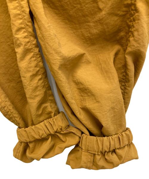 nagonstans（ナゴンスタンス）nagonstans (ナゴンスタンス) 21AW ライトシェルタフタトラックパンツ オレンジ サイズ:Sの古着・服飾アイテム