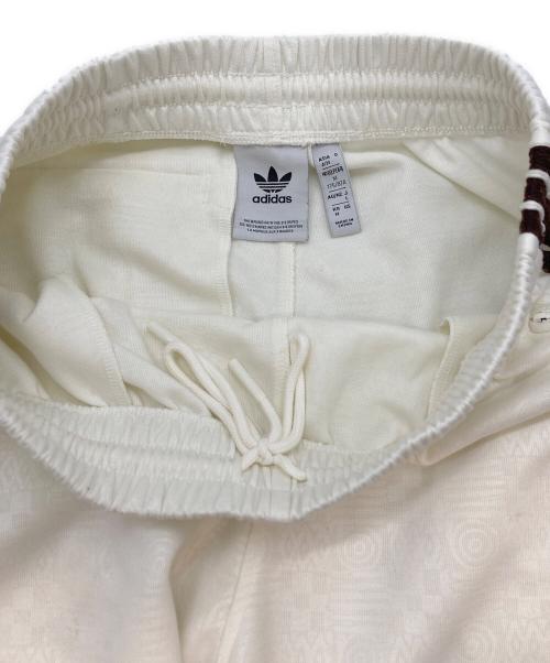 adidas（アディダス）adidas (アディダス) 80s PREMIUM EMBOSS 3-STRIPES TRACK PANT アイボリー×ブラウン サイズ:Lの古着・服飾アイテム