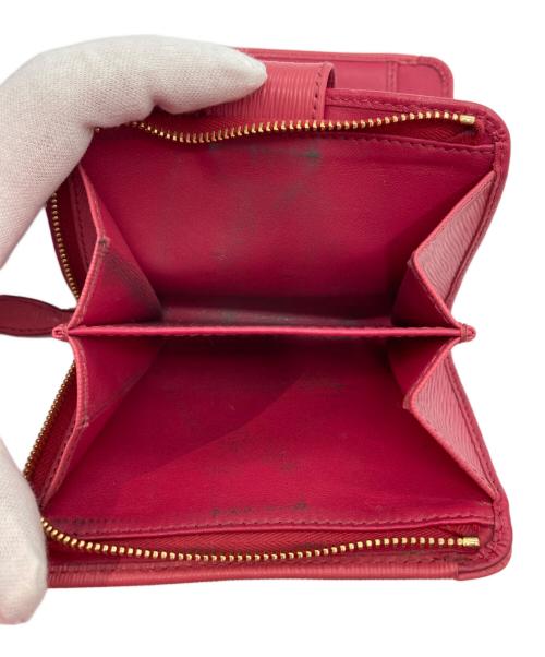 PRADA（プラダ）PRADA (プラダ) サフィアーノ 2つ折り財布 ピンクの古着・服飾アイテム