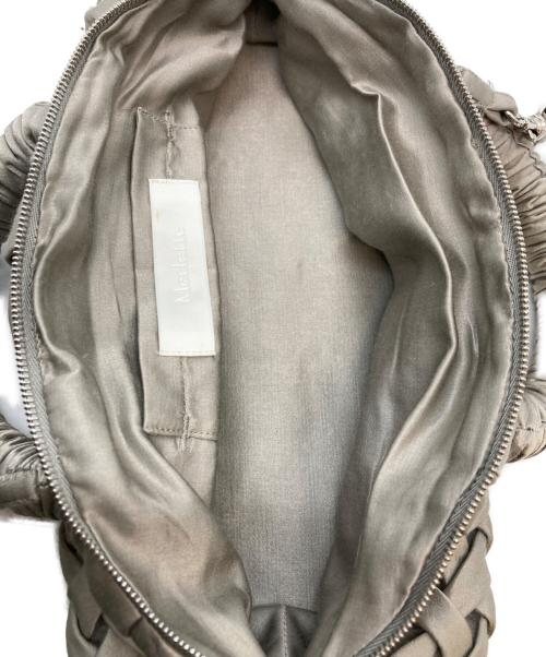 merlette（マーレット）merlette (マーレット) 22ss シルクサテン バスケットスモッキング ハンドバッグ グレーの古着・服飾アイテム