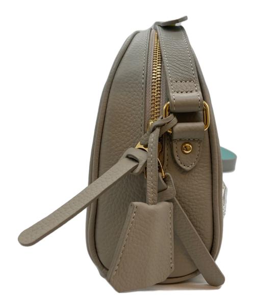 A.D.M.J.（エーディーエムジェイ）A.D.M.J. (エーディーエムジェイ) クリスタルボディバック アイボリーの古着・服飾アイテム