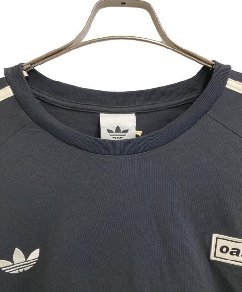 adidas（アディダス）adidas (アディダス) oasis (オアシス) OASIS TOUR live'25 ブラック サイズ:L 未使用品の古着・服飾アイテム