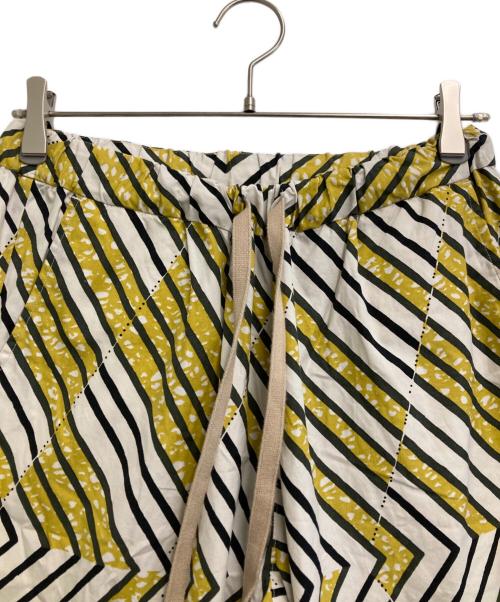 LE GLAZIK（ル グラジック）LE GLAZIK (ル グラジック) アフリカンバティックプリント イージー パンツ イエロー サイズ:36の古着・服飾アイテム