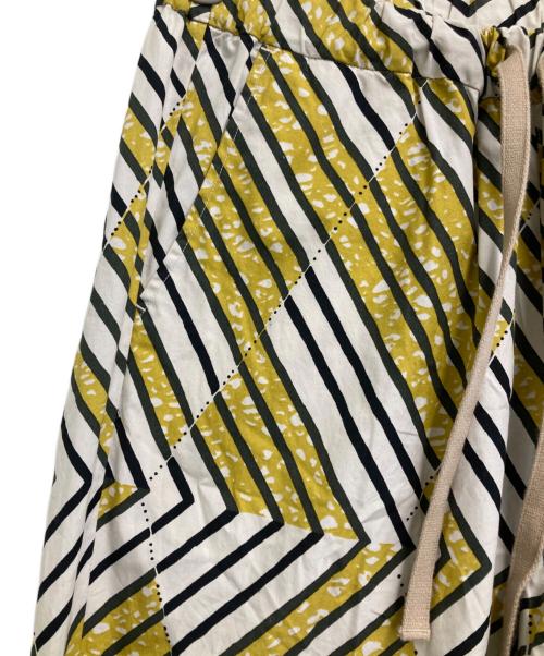 LE GLAZIK（ル グラジック）LE GLAZIK (ル グラジック) アフリカンバティックプリント イージー パンツ イエロー サイズ:36の古着・服飾アイテム