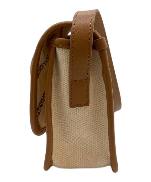 LACOSTE（ラコステ）LACOSTE (ラコステ) ヘリテージキャンバス フラップクローズコットンショルダーバッグ アイボリー サイズ:-の古着・服飾アイテム