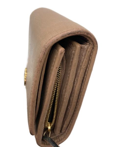 GUCCI（グッチ）GUCCI (グッチ) 2つ折り財布 ベージュの古着・服飾アイテム