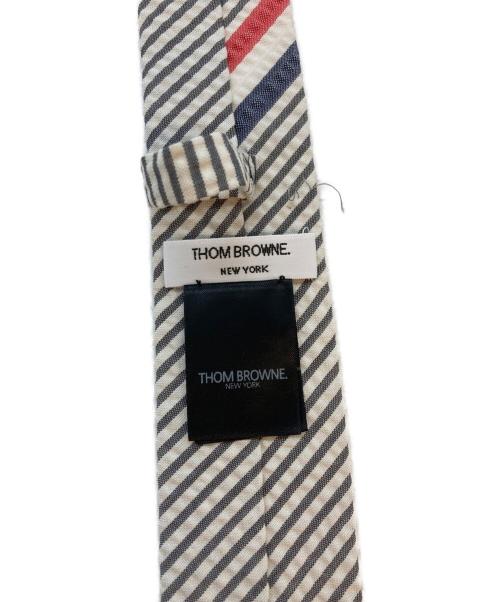Thom Browne（トムブラウン）Thom Browne (トムブラウン) ネクタイ ホワイト×グレー サイズ:Freeの古着・服飾アイテム