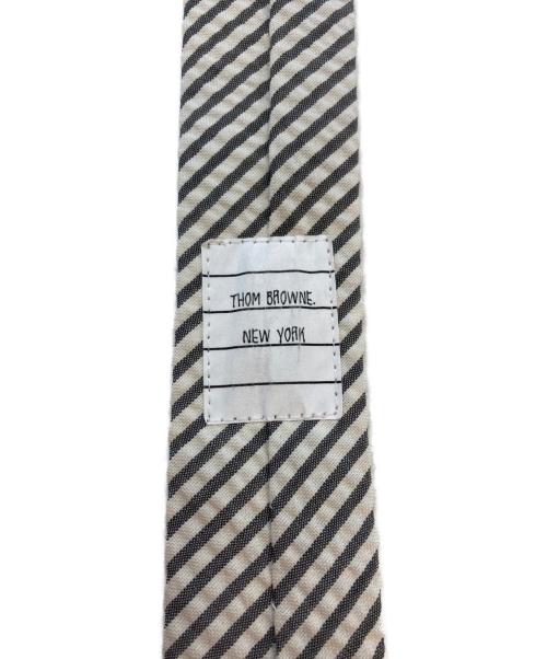 Thom Browne（トムブラウン）Thom Browne (トムブラウン) ネクタイ ホワイト×グレー サイズ:Freeの古着・服飾アイテム