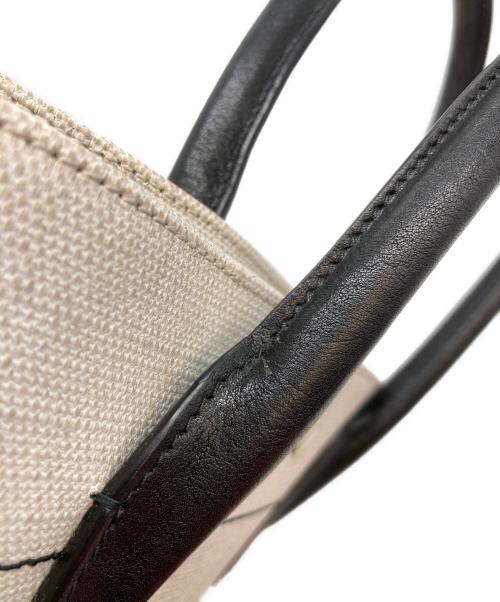 Saint Laurent Paris（サンローランパリ）Saint Laurent Paris (サンローランパリ) リヴゴーシュ トートバッグ ホワイト×ブラックの古着・服飾アイテム