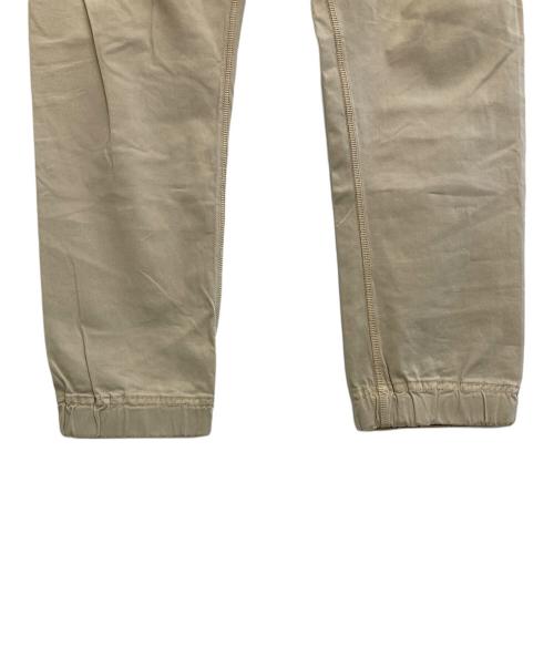 STONE ISLAND（ストーンアイランド）STONE ISLAND (ストーンアイランド) BADGE LOGO DETAIL PANTS ベージュ サイズ:Sの古着・服飾アイテム