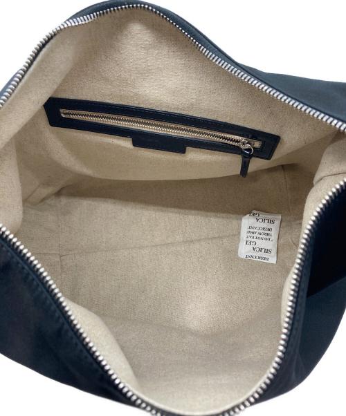 TOUT Y EST（トゥティエ）TOUT Y EST (トゥティエ) SAC CANOT TOIL ブラックの古着・服飾アイテム