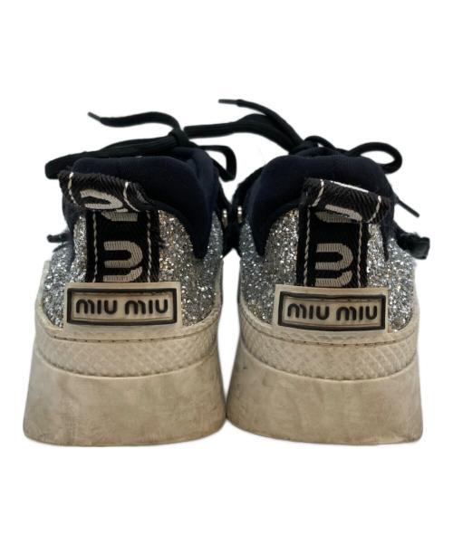 MIU MIU（ミュウミュウ）MIU MIU (ミュウミュウ) グリッターシューズ シルバー×ブラック サイズ:SIZE 38の古着・服飾アイテム