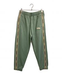maison kitsune（メゾンキツネ）の古着「FLASH FOX TRACK PANTS」｜グリーン