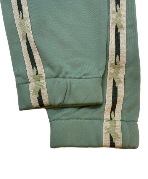 maison kitsune（メゾンキツネ）MAISON KITSUNE (メゾンキツネ) FLASH FOX TRACK PANTS グリーン サイズ:L 未使用品の古着・服飾アイテム