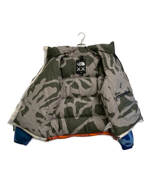 THE NORTH FACE（ザ ノース フェイス）THE NORTH FACE (ザ ノース フェイス) KAWS (カウズ) RETRO 1996 NUPTSE JACKET マルチカラー サイズ:SIZE Lの古着・服飾アイテム