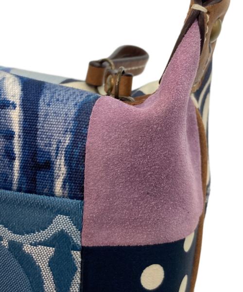 COACH（コーチ）COACH (コーチ) デニムパッチワーク アクセサリーポーチ インディゴの古着・服飾アイテム