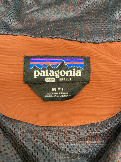 Patagonia（パタゴニア）Patagonia (パタゴニア) Isthmus Anorak オレンジ×グレー サイズ:SIZE Mの古着・服飾アイテム