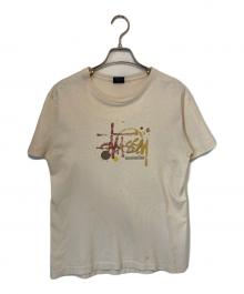 stussy（ステューシー）の古着「インクスプラッターS/S Tシャツ」｜アイボリー