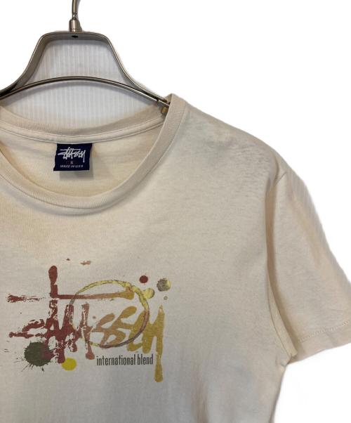 stussy（ステューシー）stussy (ステューシー) インクスプラッターS/S Tシャツ アイボリー サイズ:Sの古着・服飾アイテム