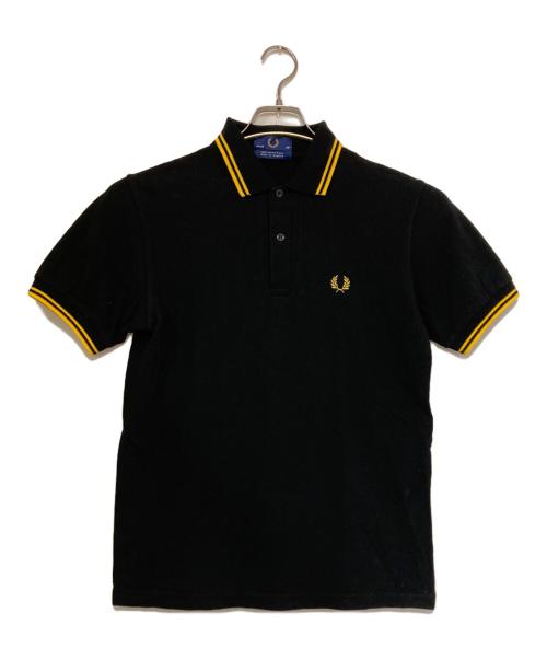 FRED PERRY（フレッドペリー）FRED PERRY (フレッドペリー) ポロシャツ ブラック×イエロー サイズ:36の古着・服飾アイテム