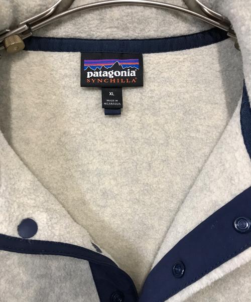 Patagonia（パタゴニア）Patagonia (パタゴニア) ライトウエイトシンチラスナップTジャケット ベージュ サイズ:XLの古着・服飾アイテム
